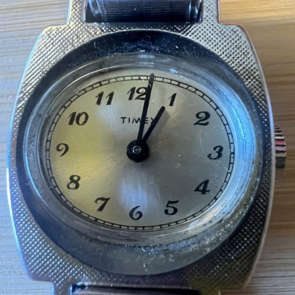 Timex Ladies mechanical windup oval dial cushion case watch