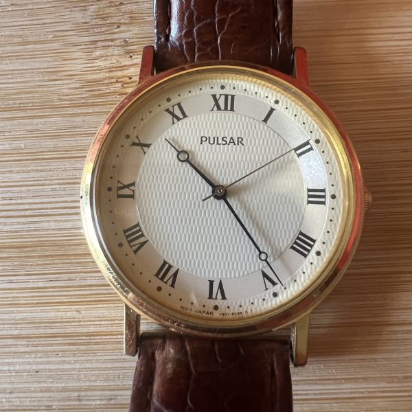 Pulsar men’s quartz round dial dress watch ref v501-9a90